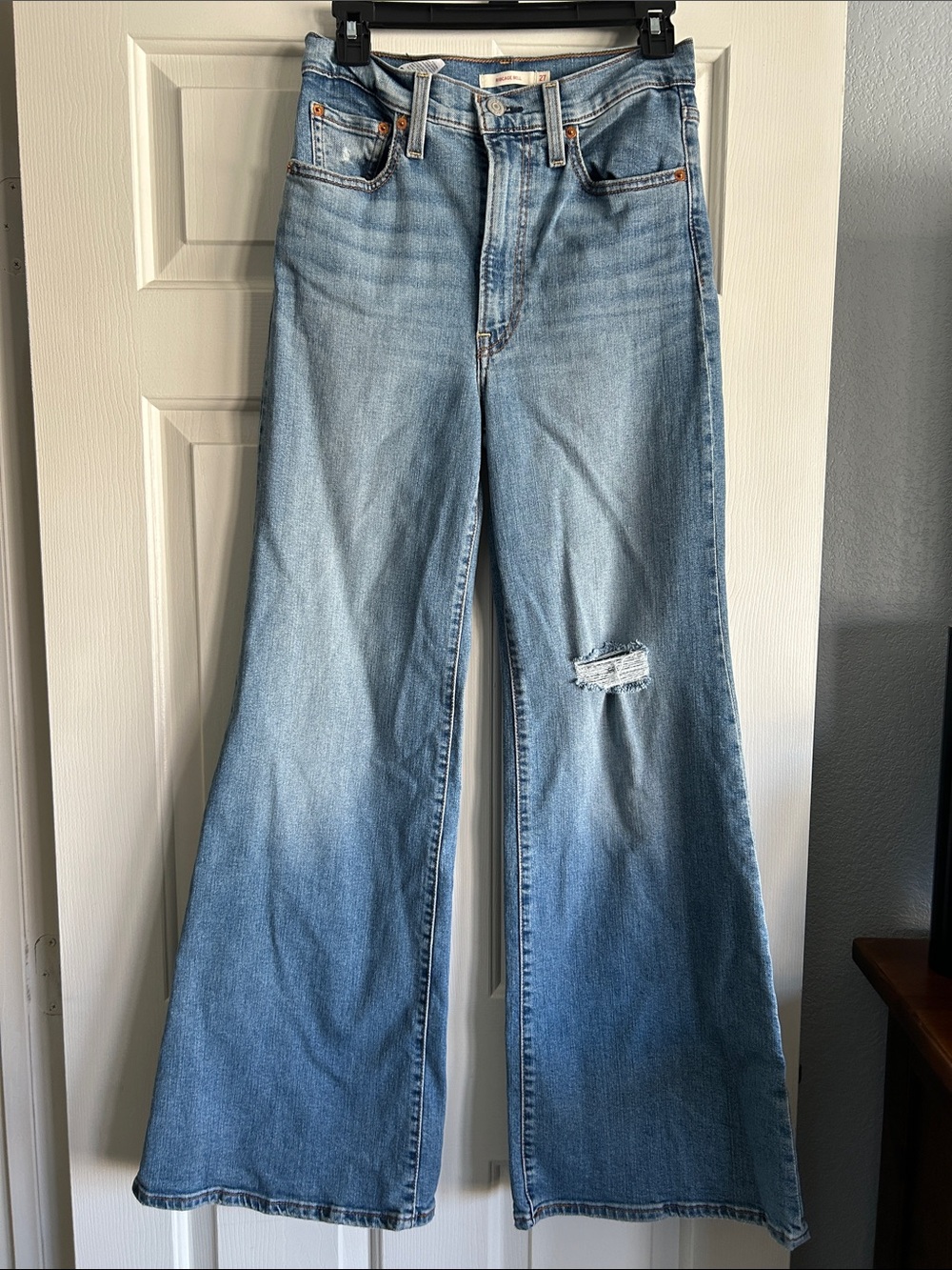 Levi's Light Blue Flare Jeans with Distressed Knee